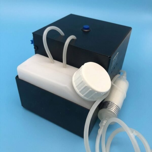 White Ink Circulation for A3 Printer India – Reliable Ink System - Close-up of a DTF printer white ink circulation reservoir tank with a white screw cap, dual top silicone lines entering the black control casing, and a side-mounted main inline filter on a light blue background.