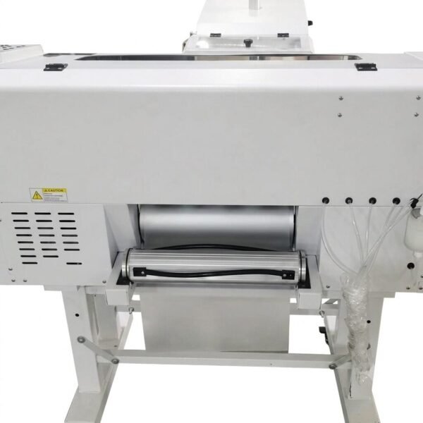 DTF Audley Dual Head I3200 Printer 12 inch with Powder Shaker – High-Precision Mid-Range DTF Printer | ProlificGeeks - Front close-up view of a white DTF powder shaker and heater unit with silver feed rollers and ink tube lines.