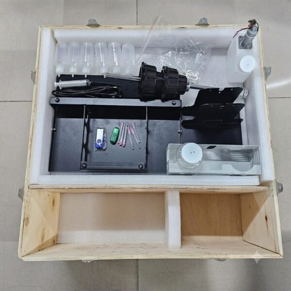 A3 DTF L18050 Printer with Module โ Powerful & Compact DTF Printing Machine | ProlificGeeks - DTF printer accessories, maintenance tools, ink bottles, roll feeder components, and USB dongle organized in a foam-lined wooden crate.